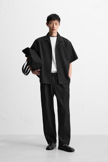 RELAXED FIT RAISED TROUSERS - Black by Zara - Image 0