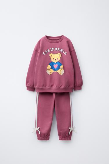 TOTAL LOOK SWEATSHIRT WITH RAISED PRINT AND JOGGER TROUSERS WITH BOWS - 977 by Zara
