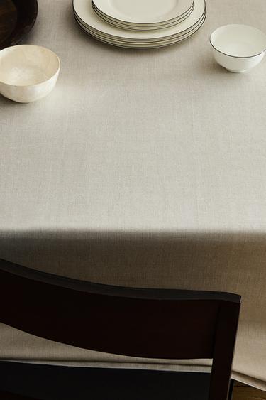 OVERLOCK RESIN-COATED COTTON TABLECLOTH - Ecru by Zara