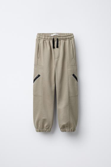 JOGGERS WITH ZIPS - Dark camel by Zara