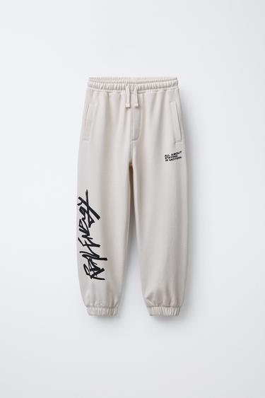 GRAFFITI PRINT JOGGER TROUSERS - Light grey by Zara - Image 0