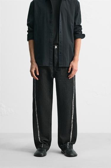 RELAXED FIT JEANS WITH FRAYED SEAMS - Black by Zara
