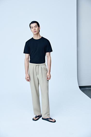 100% LYOCELL RELAXED FIT TROUSERS - camel by Zara