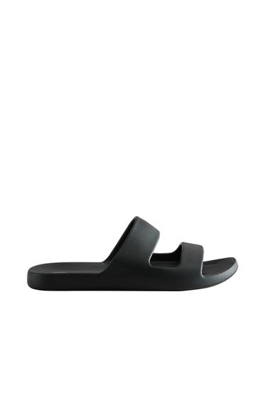 RUBBERISED FLAT SANDALS - Black by Zara