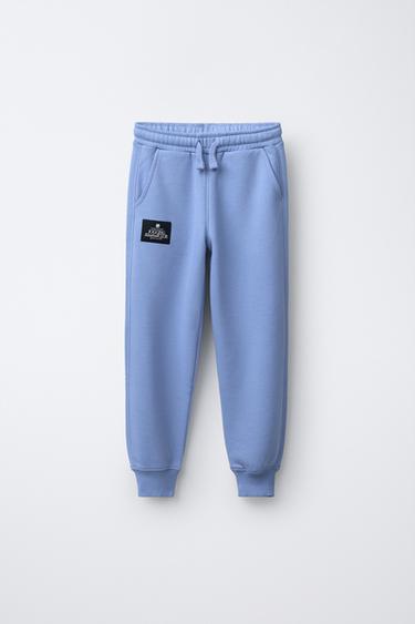 PLUSH JOGGING TROUSERS WITH LABEL APPLIQUÉ - Light blue by Zara