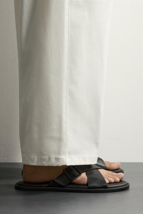BUCKLED CROSSOVER SANDALS - Black by Zara - Image 0