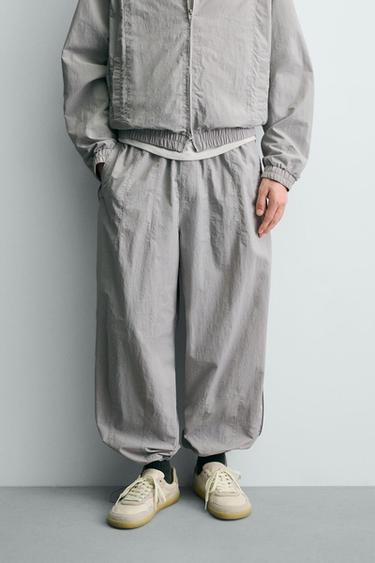 TECHNICAL JOGGING TROUSERS WITH CONTRAST SIDE TAPING - Light grey by Zara