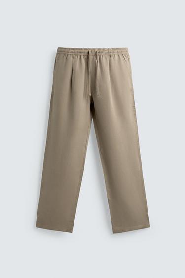 100% LYOCELL REGULAR FIT TROUSERS - camel by Zara