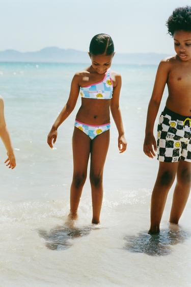 6-14 YEARS/ SMILEYWORLD ® CHECKERBOARD SWIM SHORTS - black/yellow by Zara