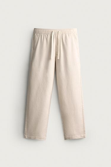 TEXTURED RELAXED FIT TROUSERS - Light beige by Zara
