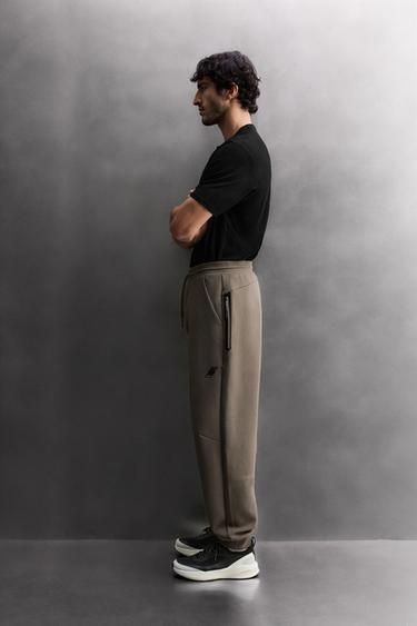 TECHNICAL TROUSERS WITH ZIPS - Sand by Zara