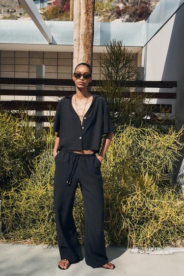 WIDE-LEG TROUSERS WITH ELASTIC WAISTBAND - Black by Zara