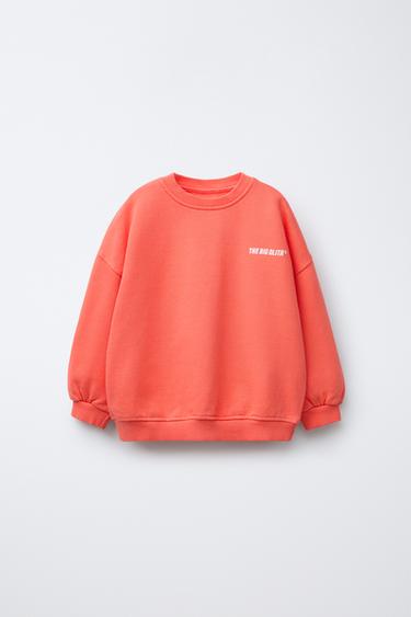 SWEATSHIRT WITH PRINTED SLOGAN - Mid-red by Zara