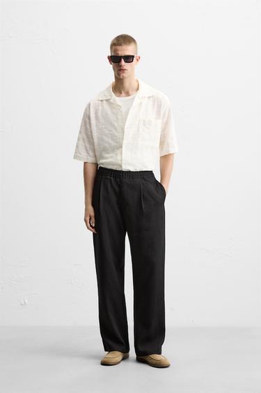 FLOWING TROUSERS WITH PLEATS - Black by Zara - Image 0