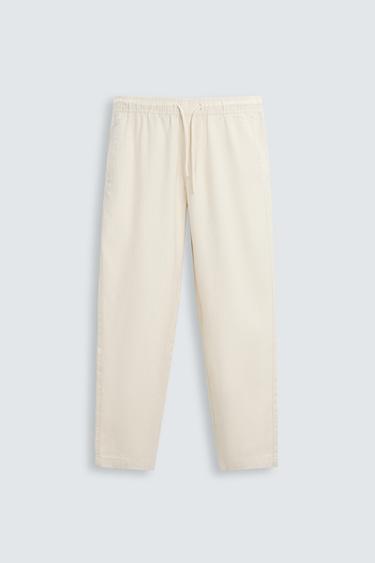 RELAXED FIT TEXTURED TROUSERS - Light beige by Zara