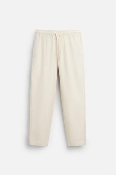 RELAXED FIT TEXTURED TROUSERS - Light beige by Zara