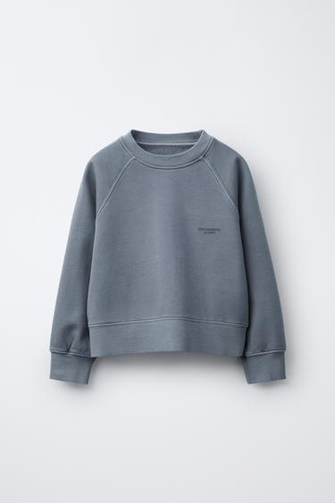 FADED-EFFECT SLOGAN SWEATSHIRT - Light blue by Zara