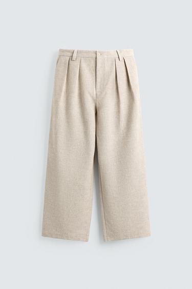 RELAXED FIT PLEATED TROUSERS - Light beige by Zara