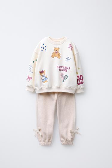 TOTAL LOOK PRINTED SWEATSHIRT AND JOGGER TROUSERS WITH BOWS -  by Zara