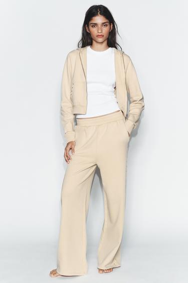 WASHED-EFFECT FLEECE TROUSERS WITH STUDS - Butter by Zara