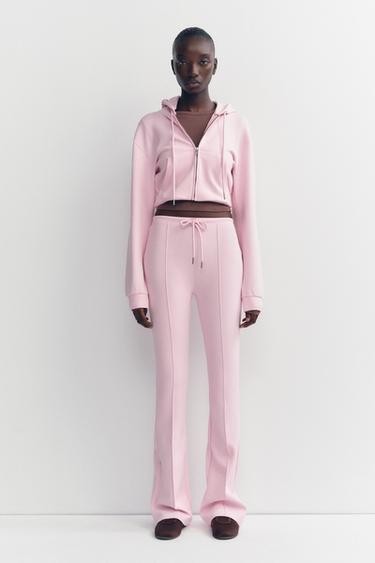 STITCHED INTERLOCK BELL BOTTOM TROUSERS - Pastel pink by Zara