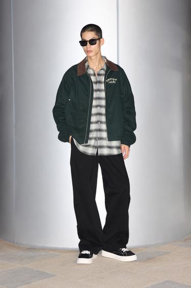 RELAXED FIT TROUSERS WITH TURNED SEAM - Black by Zara