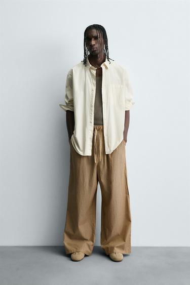 STRIPED OVERSIZE FIT TROUSERS - Yellow by Zara - Image 0