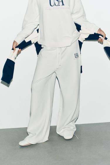 COTTON EMBROIDERED TEXT TROUSERS - Ecru by Zara