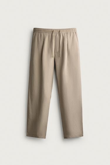 100% LYOCELL RELAXED FIT TROUSERS - camel by Zara