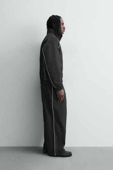 TECHNICAL JOGGING TROUSERS WITH CONTRAST SIDE TAPING - Black by Zara