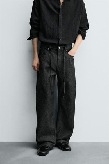 RELAXED FLARE FIT JEANS - Black by Zara