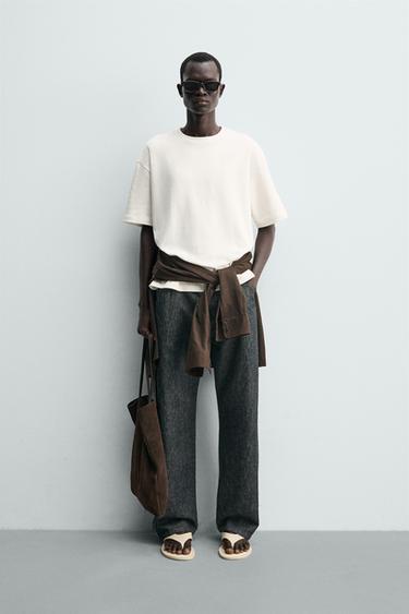 T-SHIRT WITH CONTRAST TEXTURED PATCH - White by Zara