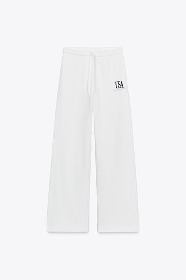 COTTON EMBROIDERED TEXT TROUSERS - Ecru by Zara