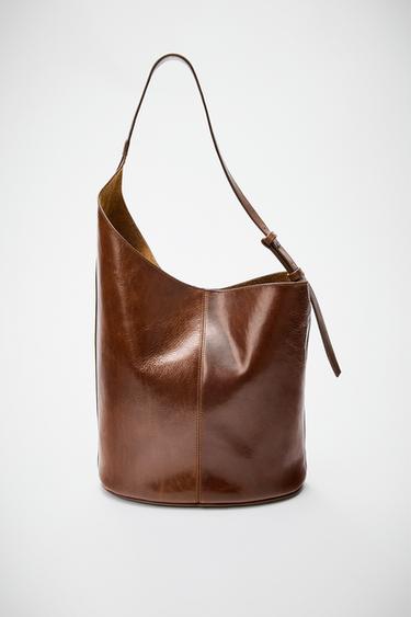 ASYMMETRIC LEATHER BUCKET BAG - Brown by Zara