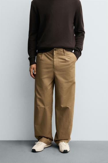 RELAXED FIT PLEATED CHINO TROUSERS - camel by Zara