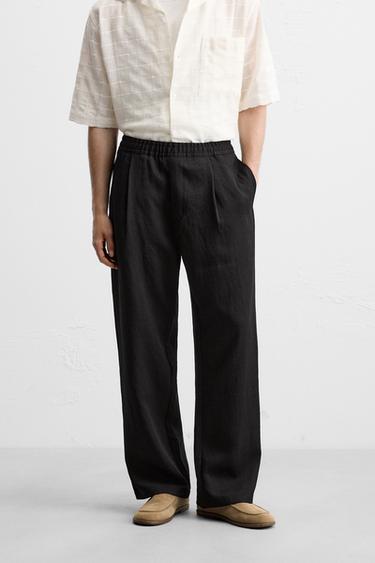 FLOWING TROUSERS WITH PLEATS - Black by Zara