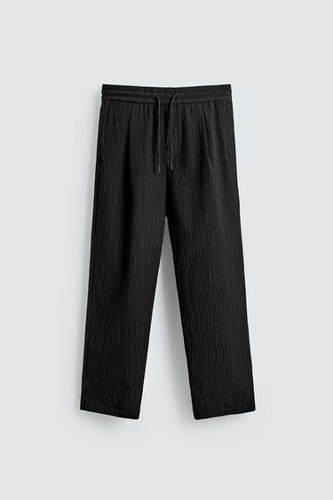 RELAXED FIT RAISED FABRIC TROUSERS - Black by Zara
