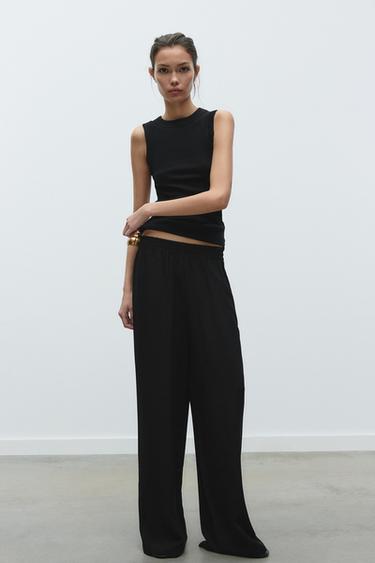 WIDE-LEG TROUSERS WITH ELASTIC WAISTBAND - Black by Zara