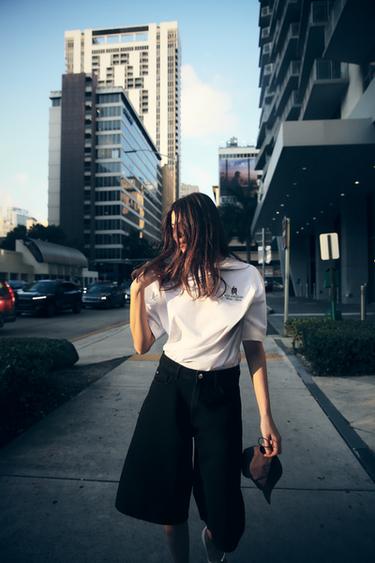 T-SHIRT WITH CONTRAST SLOGAN - White by Zara - Image 0