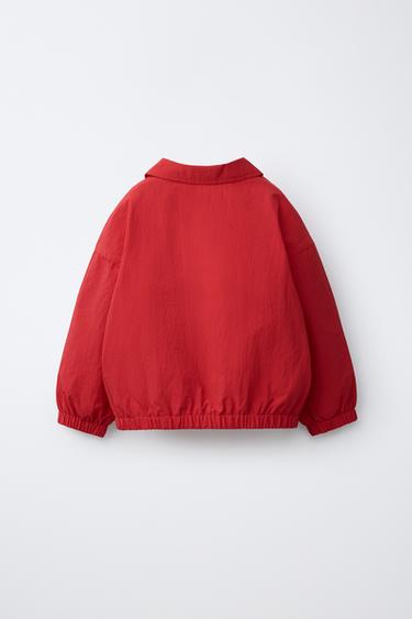 LIGHTWEIGHT WATER-REPELLENT RAINCOAT WITH EMBROIDERED TEXT - Red by Zara