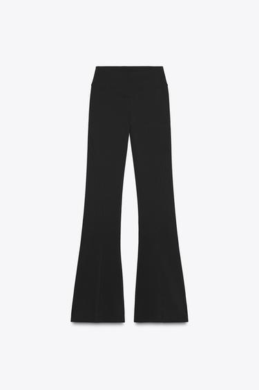 SEAMLESS POLYAMIDE FLARE TROUSERS - Black by Zara