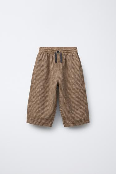 TEXTURED STRIPED BAGGY TROUSERS - camel by Zara - Image 0