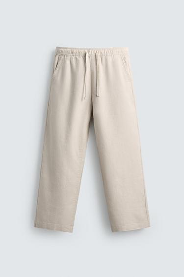 TEXTURED RELAXED FIT TROUSERS - Light beige by Zara