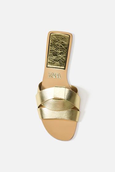 FLAT CRISS-CROSS LEATHER SLIDER SANDALS - Gold by Zara