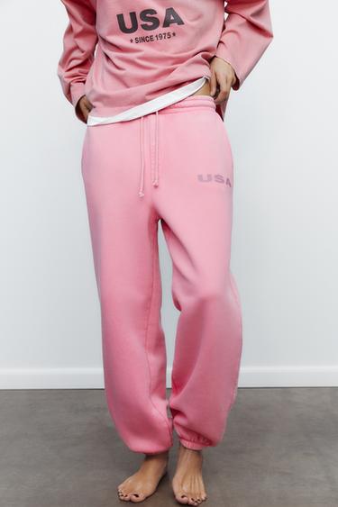 WASHED-EFFECT PLUSH TROUSERS WITH SLOGAN - Pink by Zara