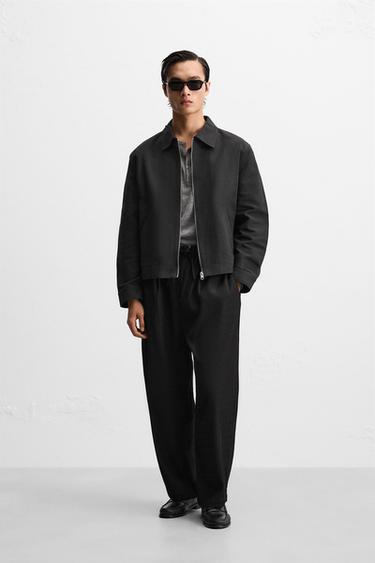 PLEATED TEXTURED TROUSERS - Black by Zara - Image 0