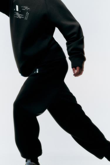SPORTY JOGGERS WITH REFLECTIVE TEXT - Brown by Zara