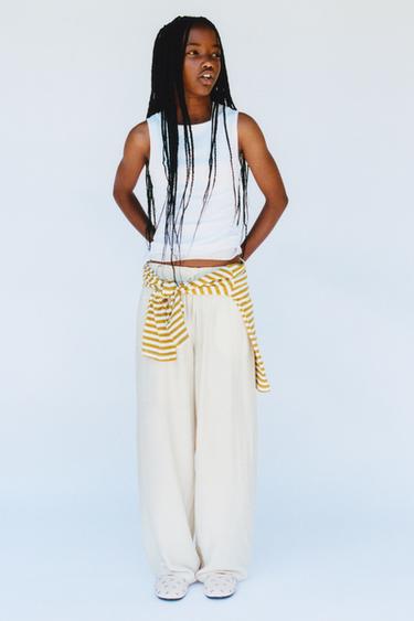 WRINKLED-EFFECT WIDE-LEG TROUSERS - Light beige by Zara