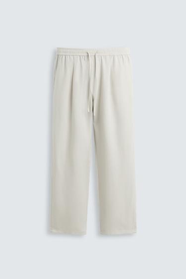 RELAXED FIT FLOWING TROUSERS - Ice by Zara