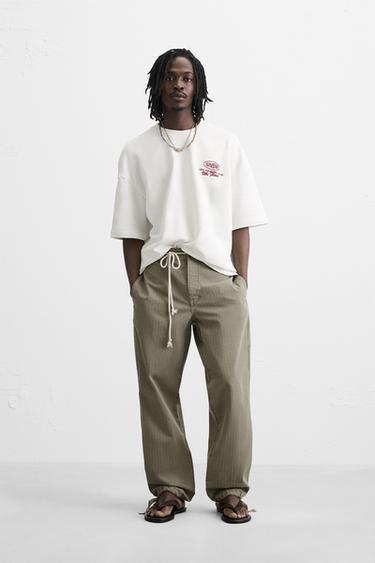 T-SHIRT WITH CONTRAST COMBINATION PRINTS - White by Zara - Image 0